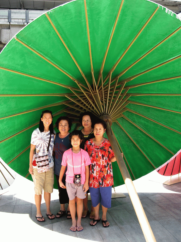 Standing tall with my mom, great aunt, aunt and cousin, Bangkok, 2009