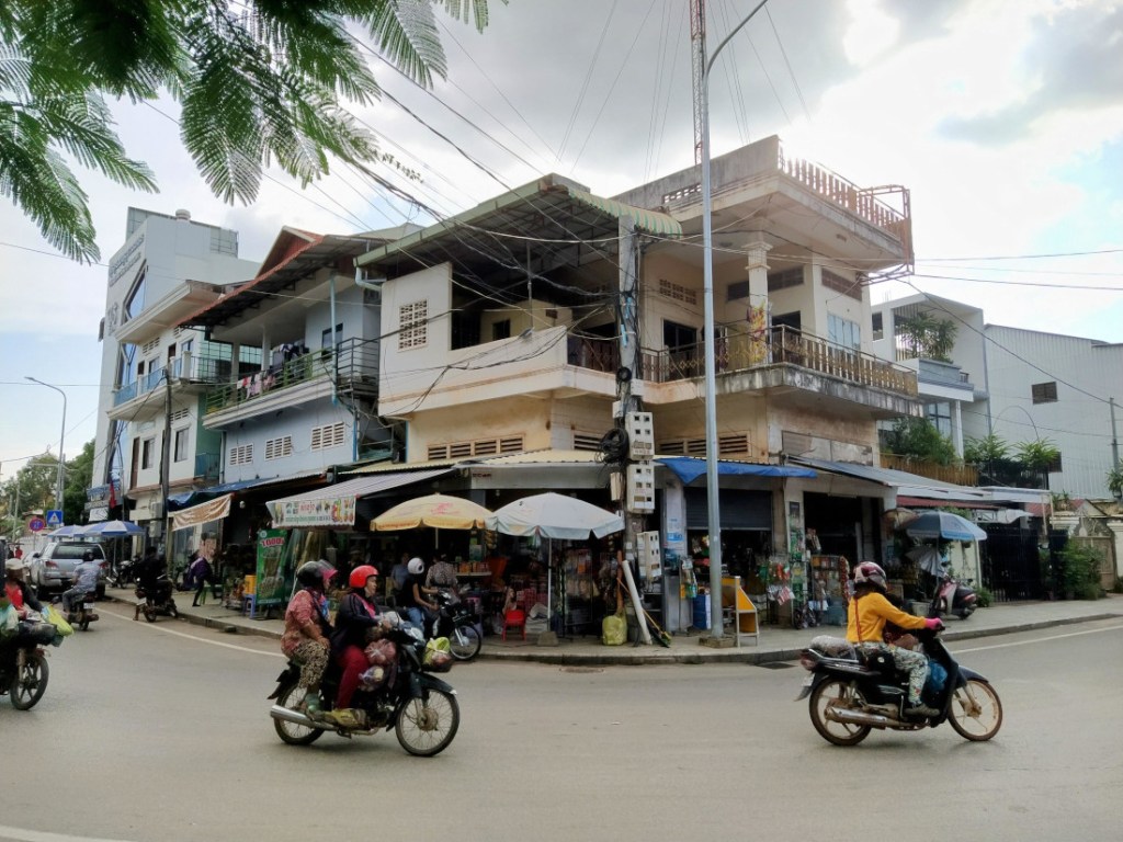 women on motos in siem reap